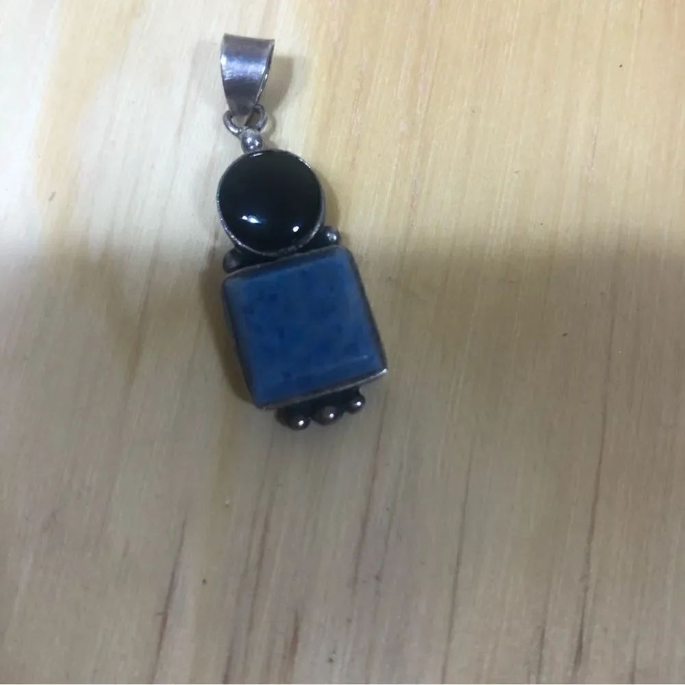 Sterling Silver Pendant With Blue Stone